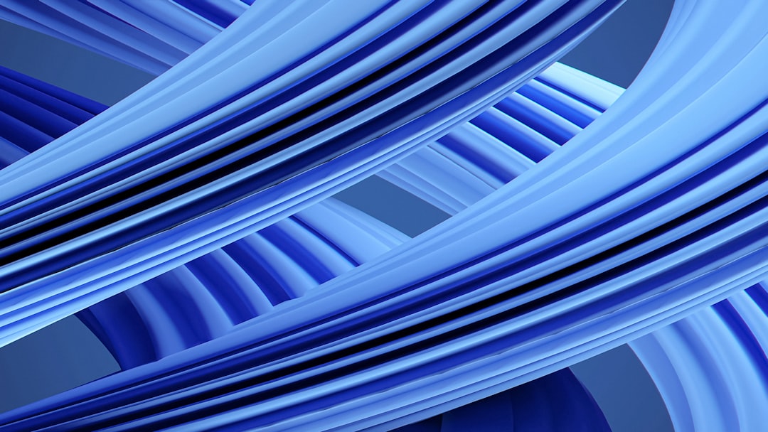 a-blue-abstract-background-with-wavy-lines-g1j7dzsltlg